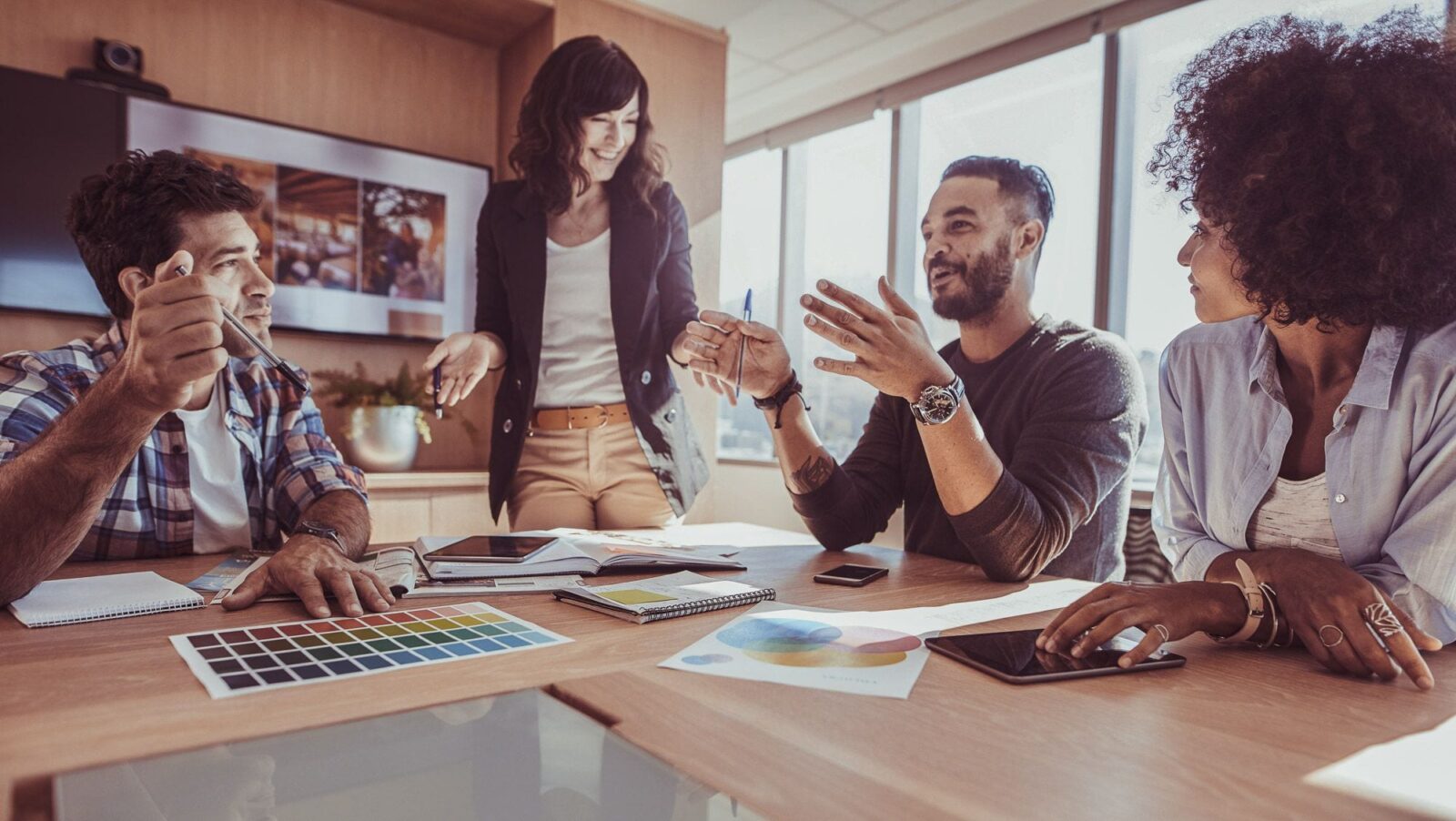 A group of people at the office having a meeting