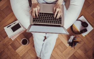 Aerial view of a person working on a laptop