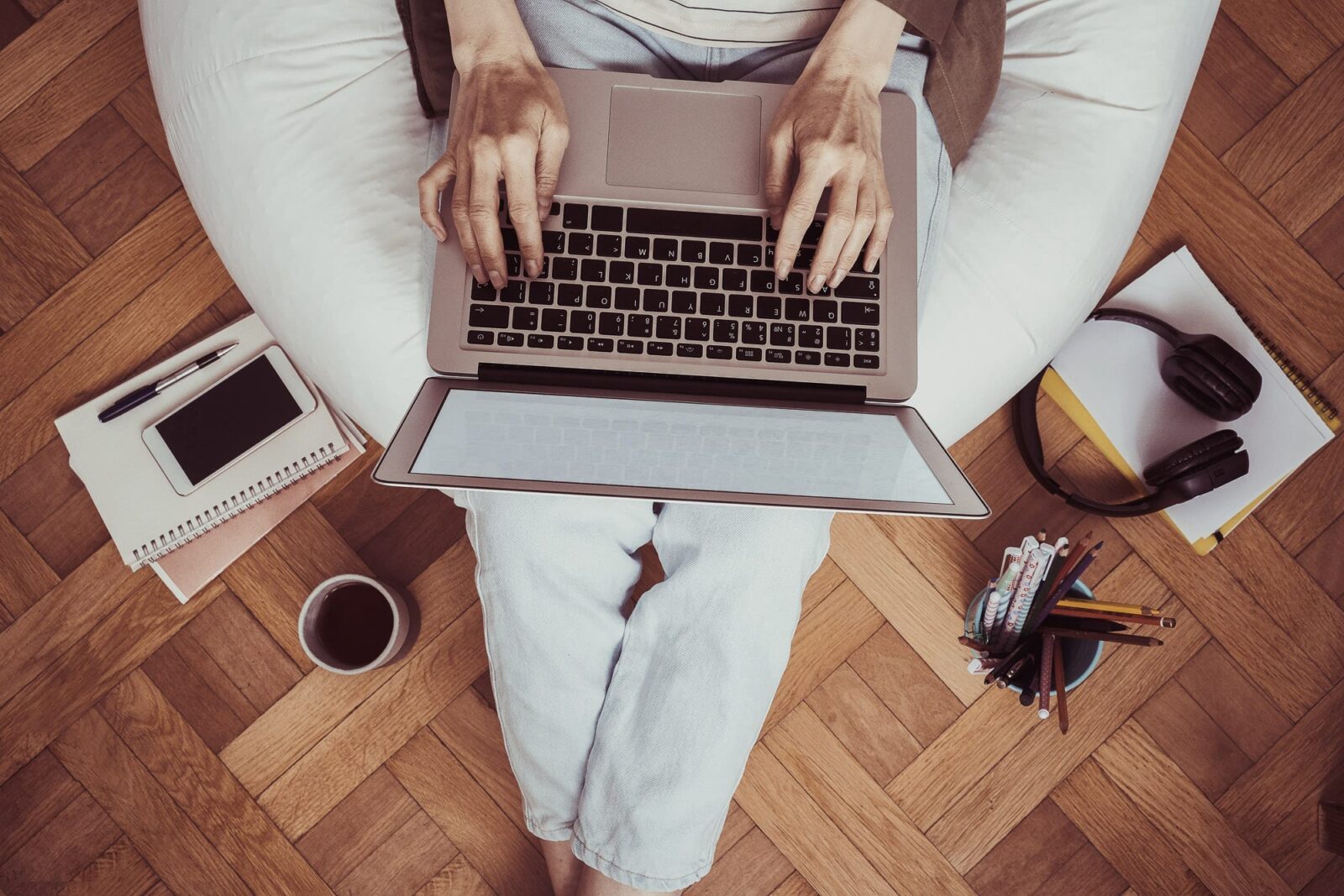 Aerial view of a person working on a laptop