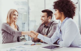 Diversity Training - Man and two women in a meeting