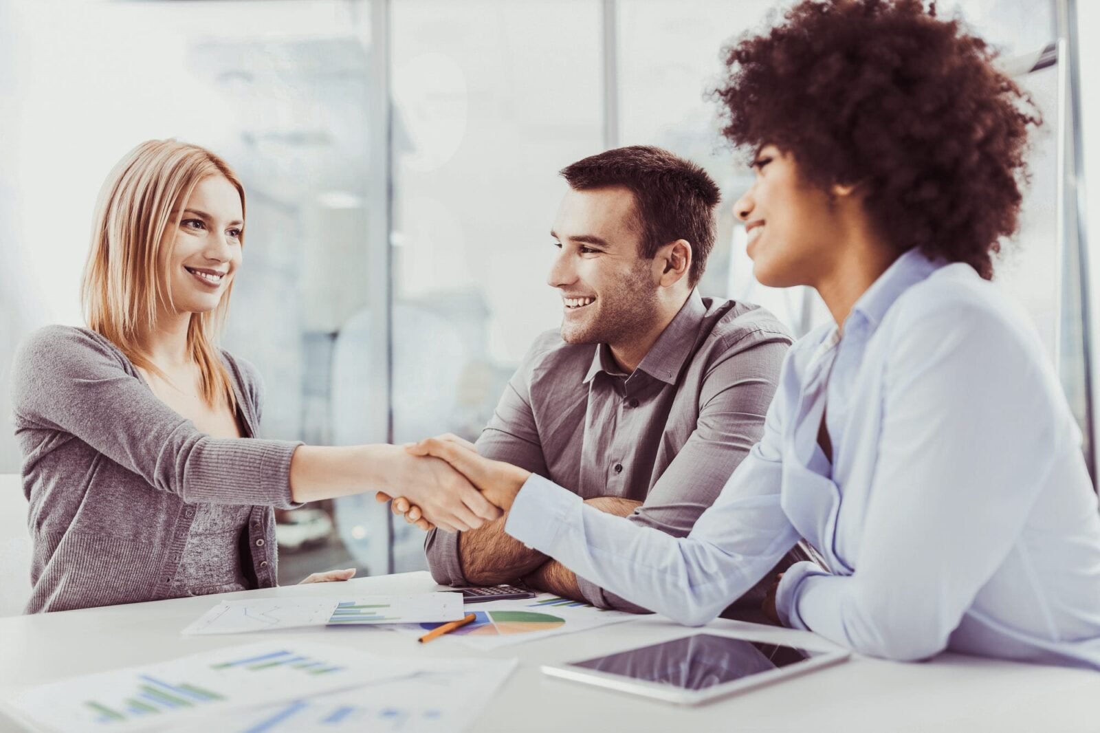 Diversity Training - Man and two women in a meeting