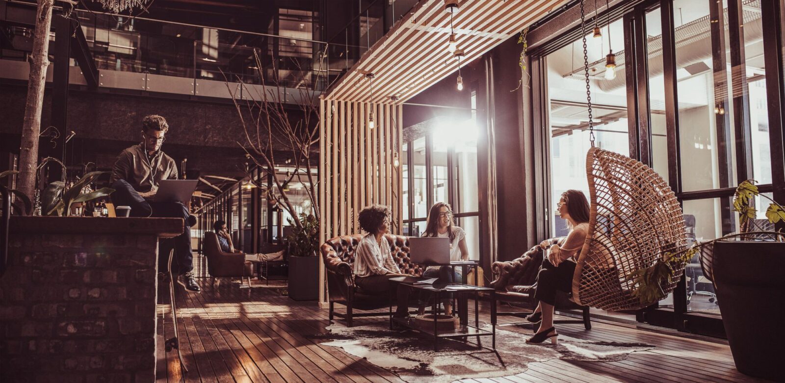 three women working in a coffee shop